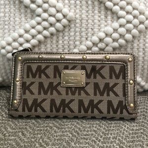Brown Michael Kors wallet with gold studs